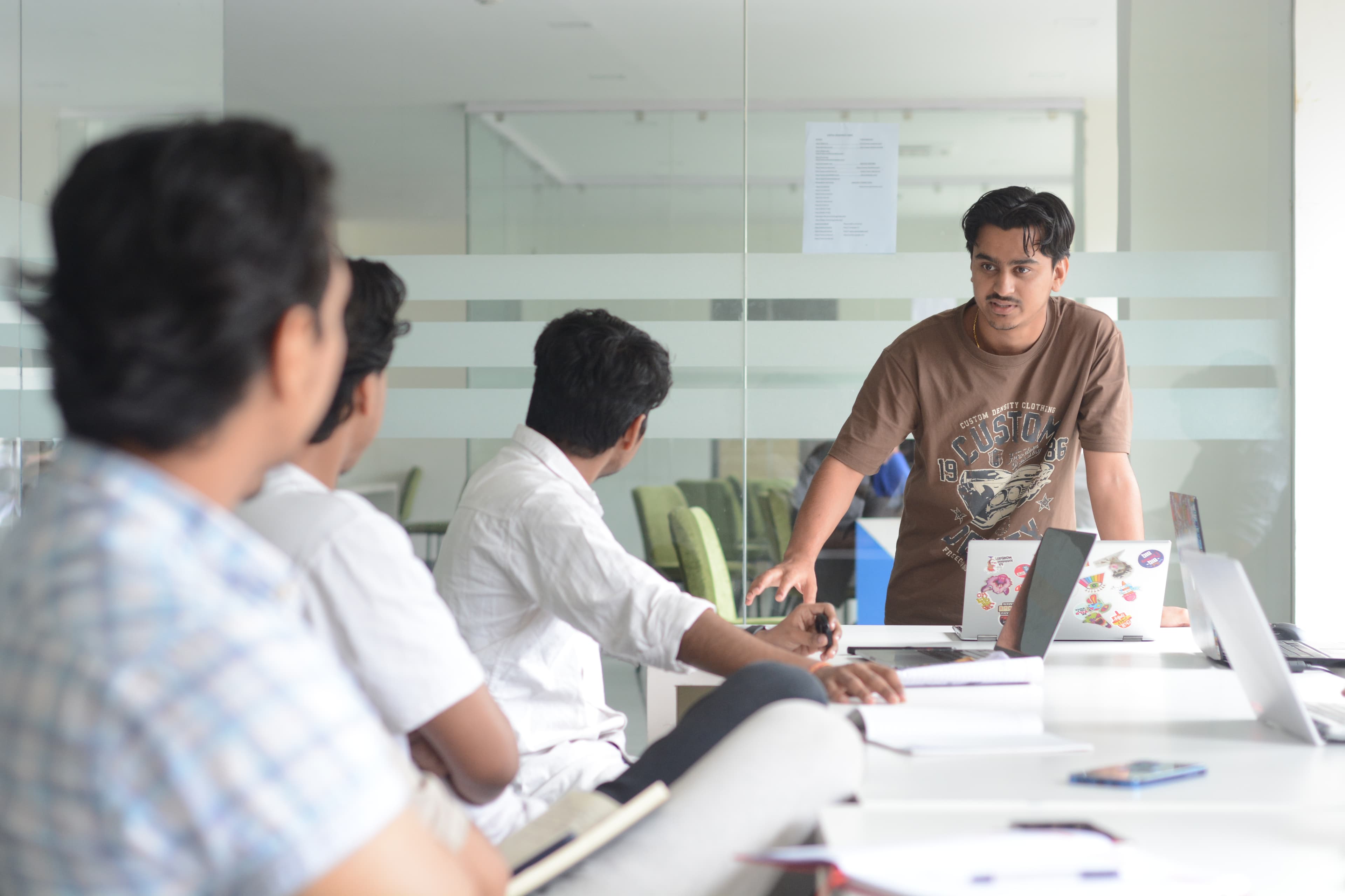 Group of team members collaborating at a table